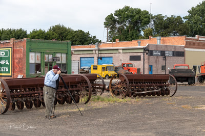 Photographer getting an overview of trucks