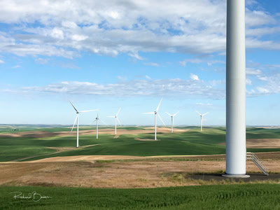 Wind turbine base and others in the distance.
